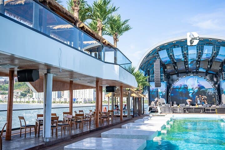 Dolphin Day Cruise Halong Bay Luxury Day Trip with Pool, Kayaking & Sunset Party photo 6