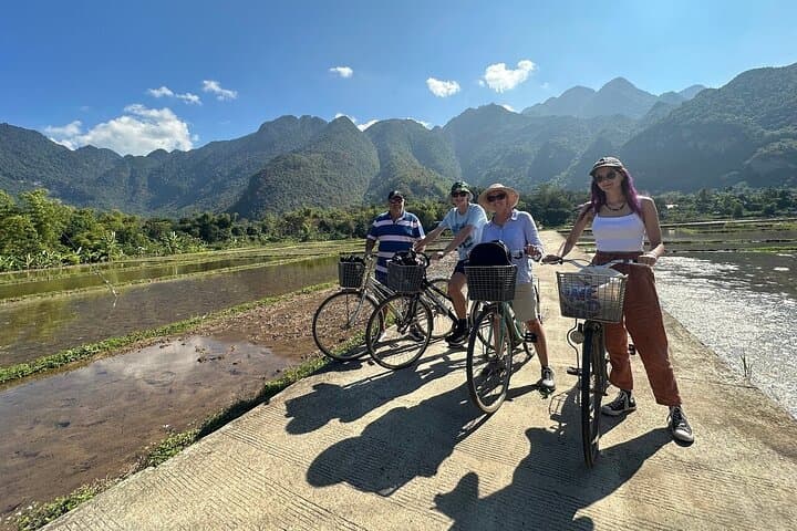 Mai Chau Deluxe Day Tour: Limousine Transfer, Biking & Nhim Cave Exploration