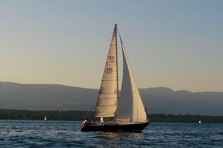 Geneva Sunset Sailing: Private Lake Geneva Cruise with Swim, Snacks, and Sailing Lessons