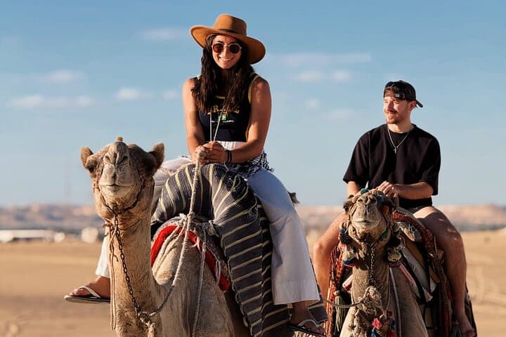 Siwa Oasis Camel Ride & Sandboarding at Sunset or Sunrise