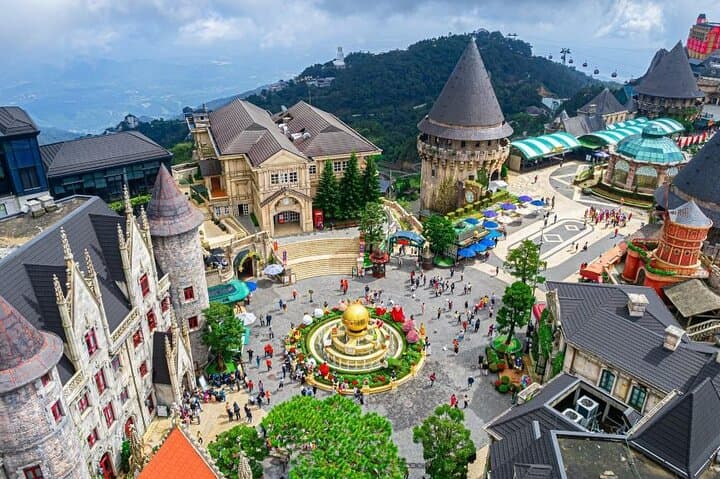 Da Nang Day Tour: Ba Na Hills, Golden Bridge & Dragon Bridge — Cable Car, French Village & Night Show photo 3