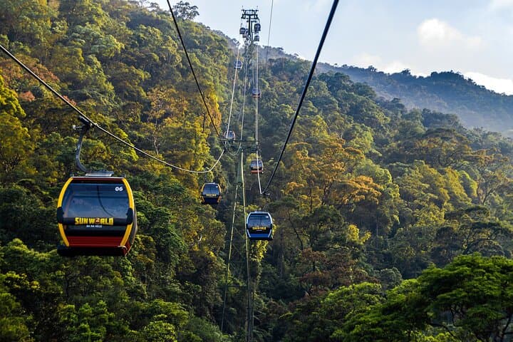 Da Nang Day Tour: Ba Na Hills, Golden Bridge & Dragon Bridge — Cable Car, French Village & Night Show photo 2
