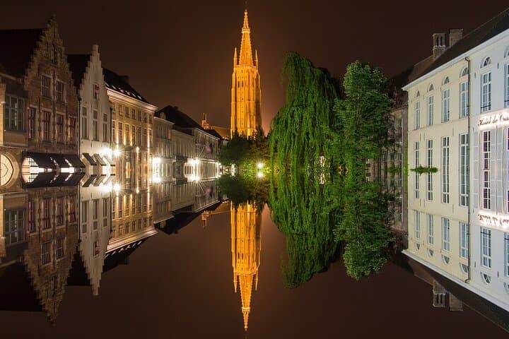 Bruges Guided Day Trip from Paris: Canal Cruise & Historic Walking Tour