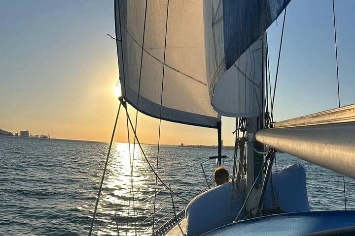 Sunset Sailing on Lisbon's Tagus: Bridge Views, Belém Tower & Local Wines photo 2