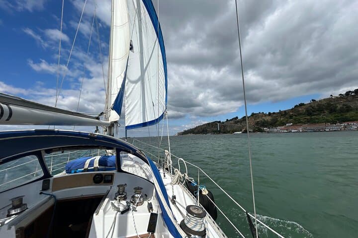 Sunset Sailing on Lisbon's Tagus: Bridge Views, Belém Tower & Local Wines photo 3