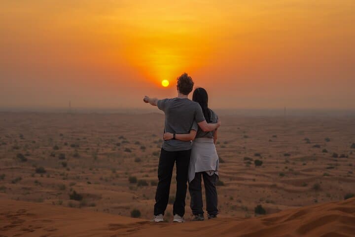 Dubai Sunrise Desert Safari: Dune Bashing, Sandboarding & Camel Ride