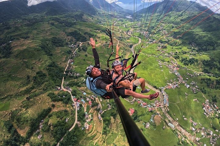 Soar Over Sapa: Fansipan Tandem Paragliding Above Rice Terraces photo 5