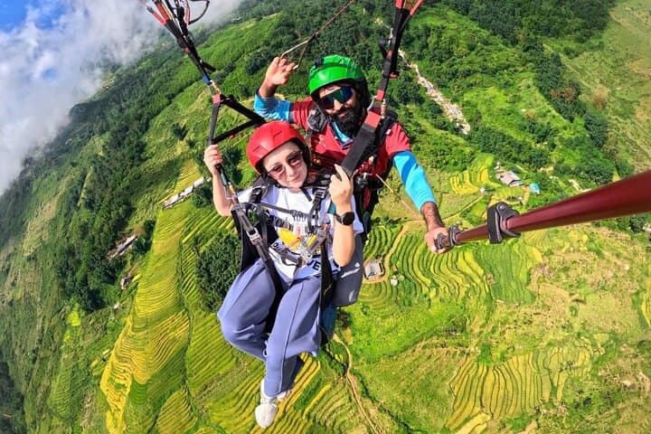 Soar Over Sapa: Fansipan Tandem Paragliding Above Rice Terraces