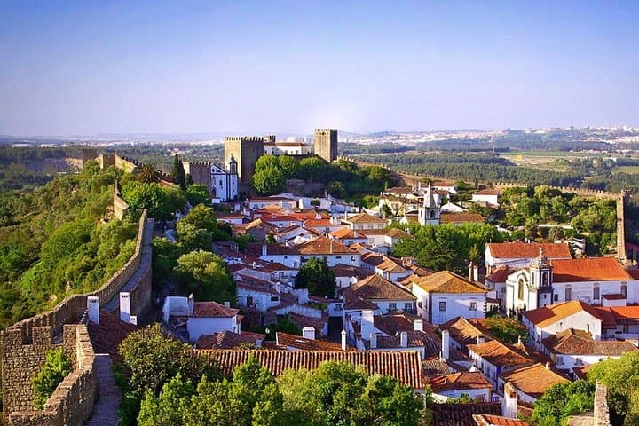 Fatima, Batalha, Nazaré & Óbidos Day Trip from Lisbon — Pilgrimage, Atlantic Waves and Medieval Streets photo 3