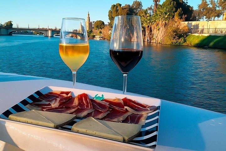 Seville Guadalquivir River Cruise with Iberian Ham Tapa photo 1