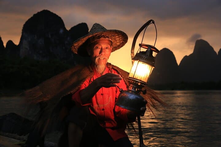 Li River Sunrise: Private Cormorant Fisherman Photography Session in Yangshuo photo 1
