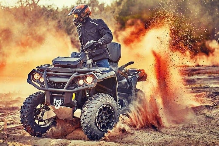 Sunset Quads and Campfire Tagines: Agafay Desert Quad Bike, Camel Ride & Dinner Show photo 1