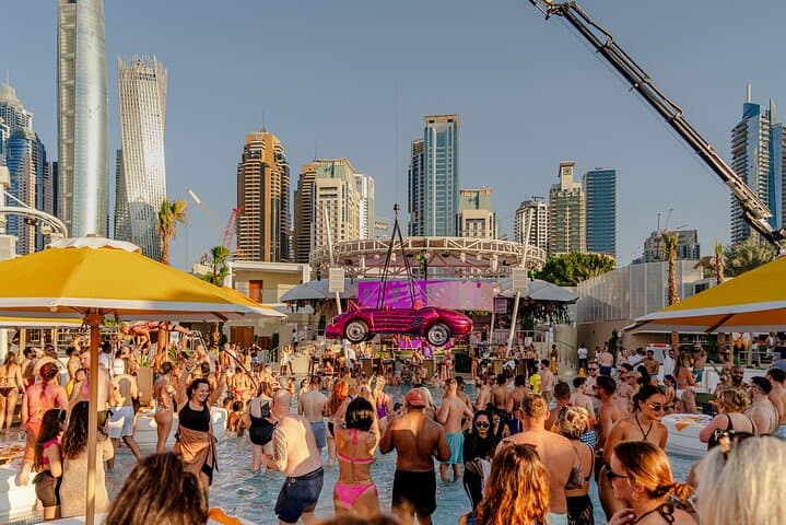 Dubai Pool Party & Top Nightclub Tour: Day-to-Night Party Bus Experience