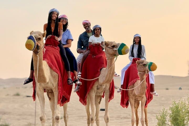 Private Abu Dhabi Desert Safari: Camel Ride, Sandboarding & Sunset BBQ Experience photo 4