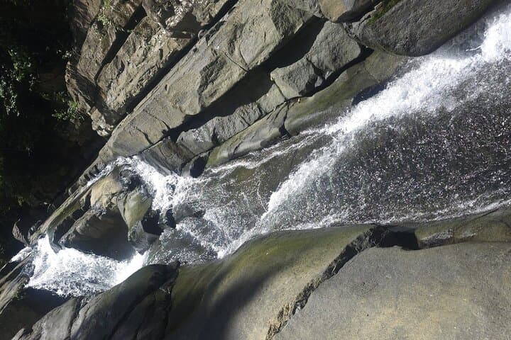 El Yunque Waterslides & Luquillo Beach Day Tour: Rainforest Slides, River Swim & Local Eats photo 3