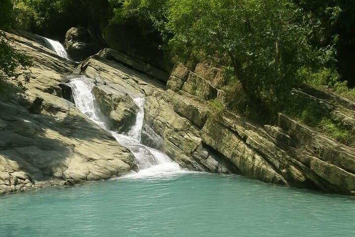 El Yunque Waterslides & Luquillo Beach Day Tour: Rainforest Slides, River Swim & Local Eats photo 5