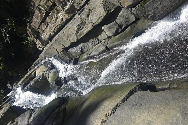 El Yunque Waterslides: Natural Rock Slides & River Swim Day Trip from San Juan photo 3
