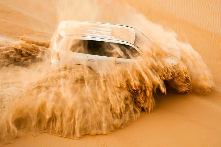 abu-dhabi-evening-desert-safari-dune-bashing-sandboarding-and-bedouin-camp photo 2