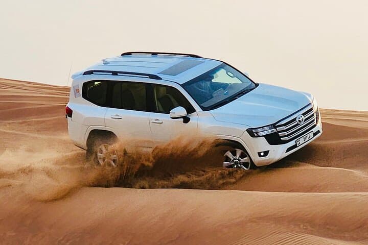 Evening Dubai Desert Safari: Quad Biking, Dune Bashing & BBQ Experience photo 3