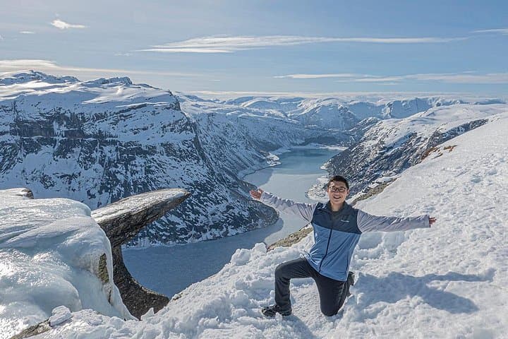 Trolltunga Winter Hike: Guided Snowshoe Trek & Snowracer Descent in Hardangerfjord