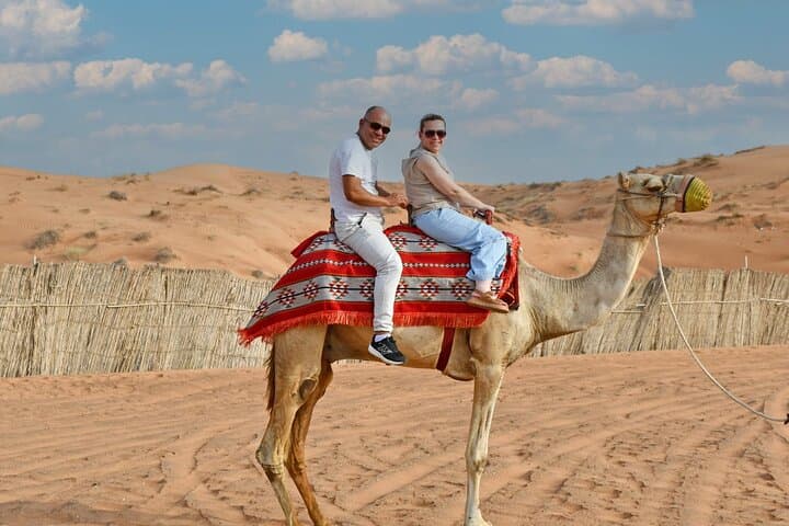 Private Morning Desert Safari Dubai: Sunrise Dune Bashing, Camel Ride & Sandboarding