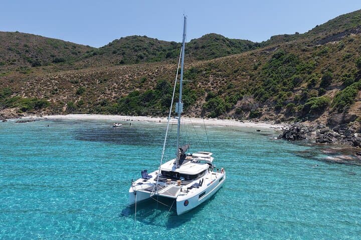 Sunset Catamaran to Agriates: Swim L'Acciolu & Gourmet Aperitif from L'Île-Rousse photo 2