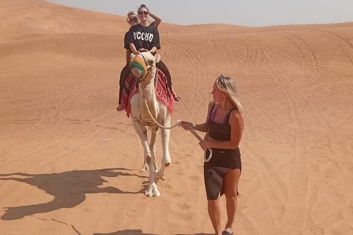 Morning Dubai Desert Safari — Dune Bashing, Sandboarding & Camel Ride photo 4