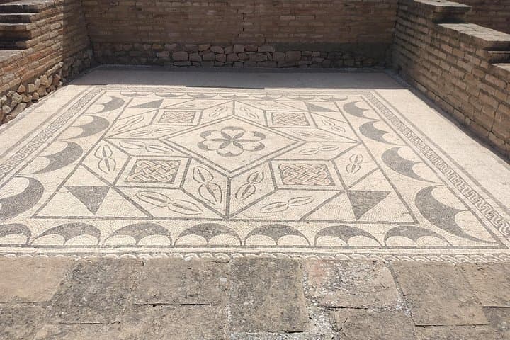 Explore Itálica: Private Walk Through Spain's First Roman City and Amphitheatre photo 5