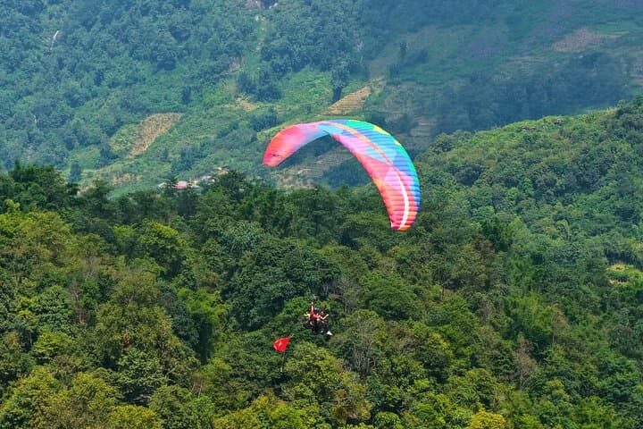 Soar Over Sapa: Fansipan Tandem Paragliding Above Rice Terraces photo 3