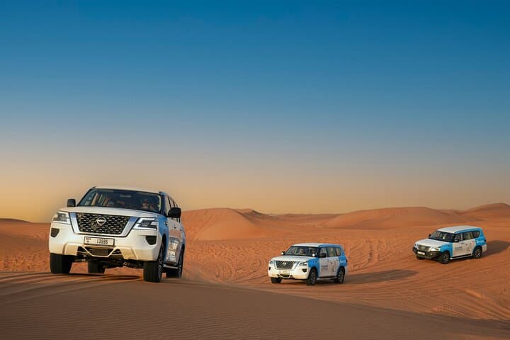Dubai Red Dunes Half-Day Safari: Dune Bashing, Sandboarding & Camel Rides photo 4
