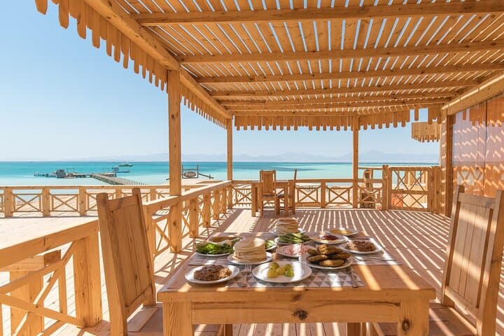 Orange Bay Day Trip: Snorkel, Beach Lunch & Banana Boat from Hurghada photo 3