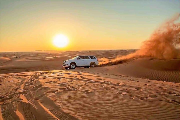 Morning Desert Safari Dubai: Dune Bashing, Sandboarding & Sunrise Camel Ride photo 3