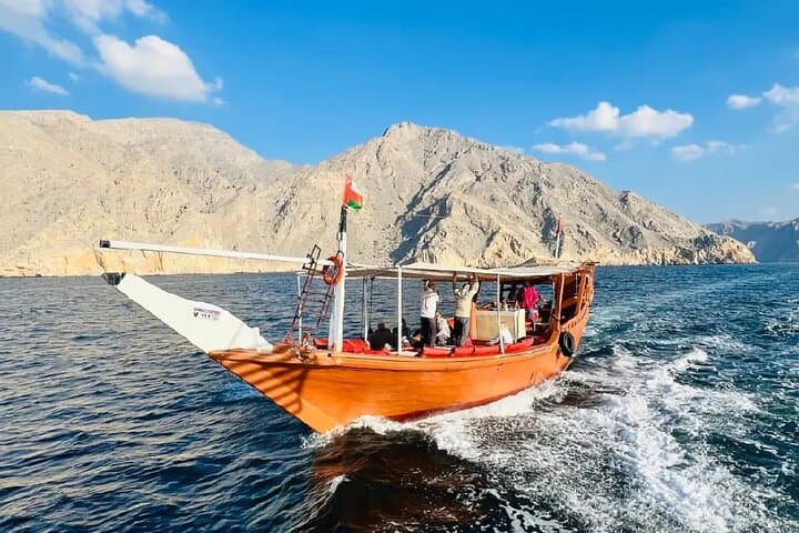 Khasab Musandam Full-Day Dhow Cruise — Dolphins, Snorkel & Telegraph Island photo 1