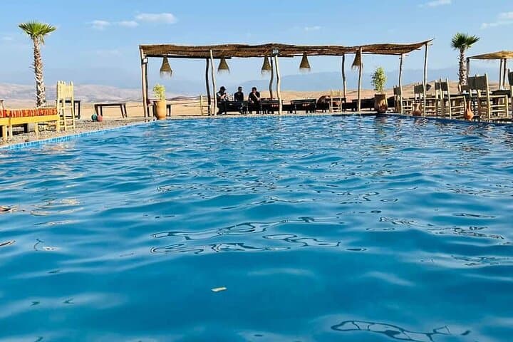 Agafay Desert Pool Day Trip with Sunset Camel Ride and Moroccan Dinner