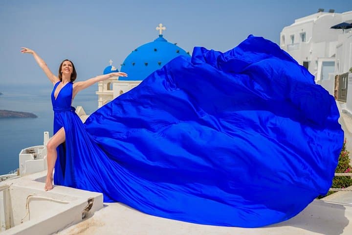 Santorini Flying Dress Photoshoot in Imerovigli: Blue-Dome Sea-View Session photo 4