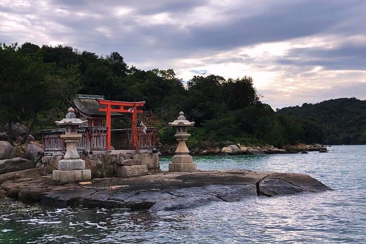 Miyajima Private Shrine Cruise: Sea Worship, Torii Views & Oyster Rafts photo 2