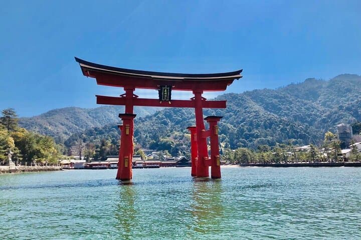 Miyajima Private Shrine Cruise: Sea Worship, Torii Views & Oyster Rafts photo 1