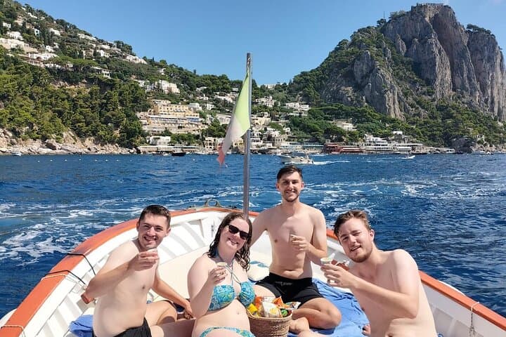 Capri Scenic Boat Tour with Swimming, Limoncello and Snack photo 2