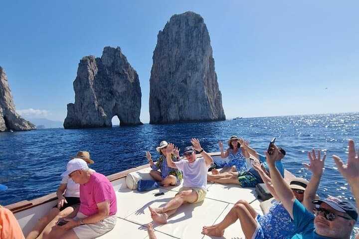 Capri Scenic Boat Tour with Swimming, Limoncello and Snack photo 4