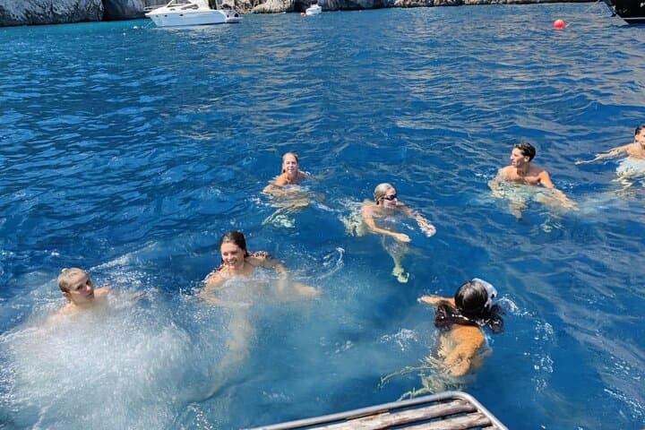 Capri Scenic Boat Tour with Swimming, Limoncello and Snack photo 5