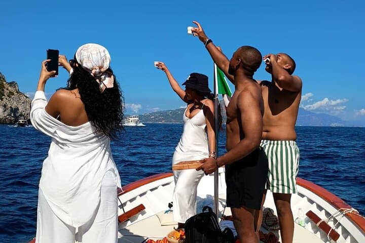 Capri Scenic Boat Tour with Swimming, Limoncello and Snack photo 6