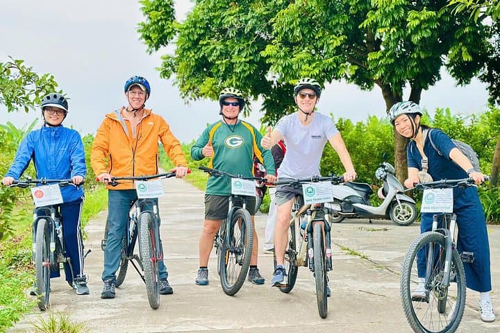 Biking to Bat Trang: Half-Day Ceramics Village Tour from Hanoi photo 1