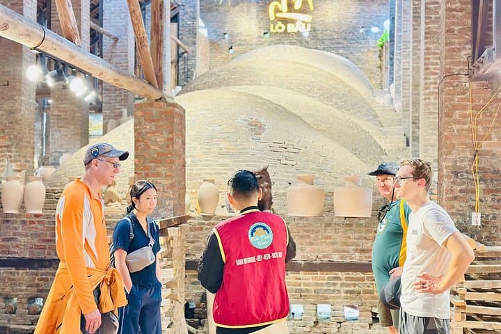 Biking to Bat Trang: Half-Day Ceramics Village Tour from Hanoi photo 4