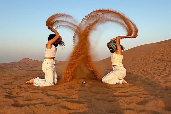 Evening Lahbab Desert Safari: 4x4 Dune Bashing, Camel Ride & BBQ Under the Stars photo 1