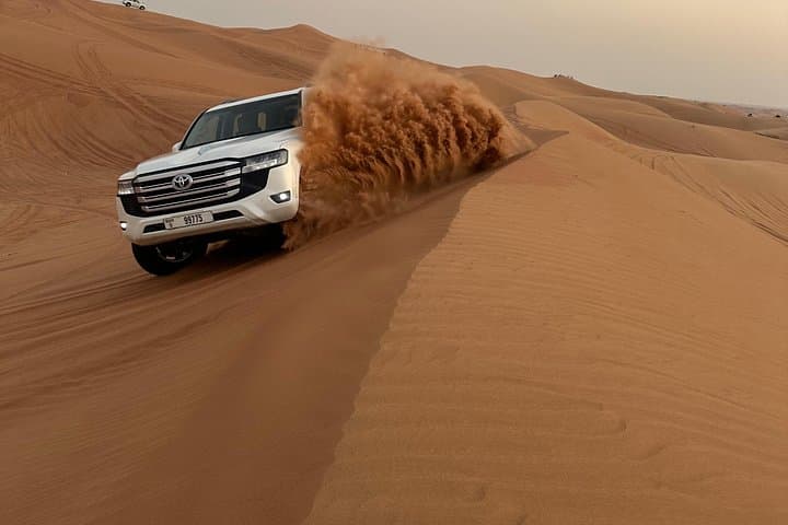 Evening Lahbab Desert Safari: 4x4 Dune Bashing, Camel Ride & BBQ Under the Stars photo 3