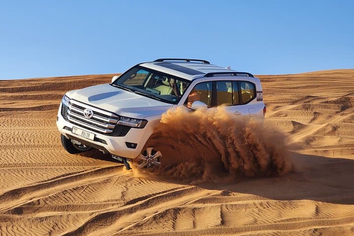 Red Dunes Desert Safari Dubai — Quad Bike, Dune Bashing & BBQ Dinner