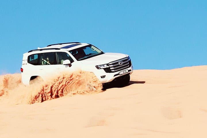 Morning Red Dunes Desert Safari with Camel Ride & Sandboarding — Dubai Adventure photo 2