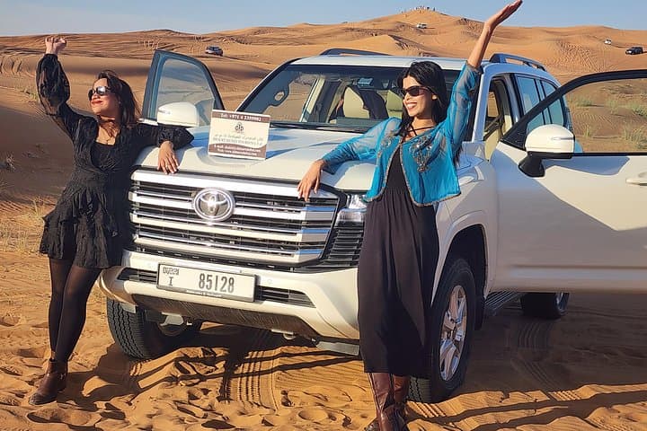 Morning Red Dunes Desert Safari with Camel Ride & Sandboarding — Dubai Adventure photo 1