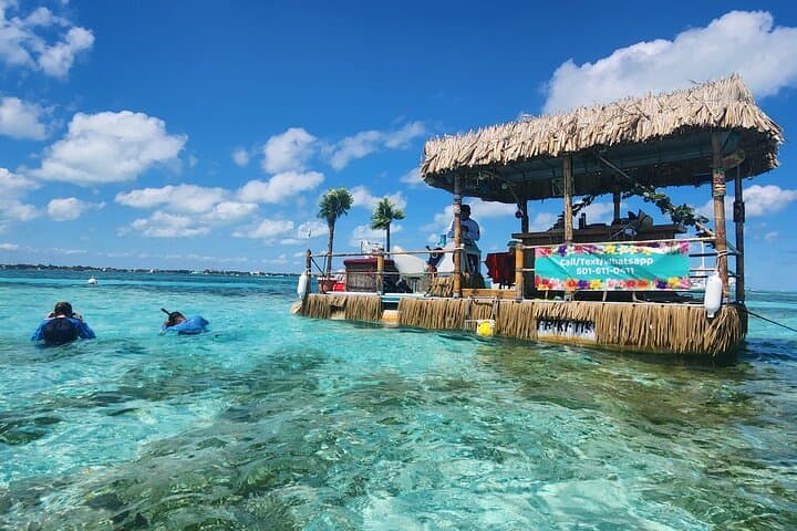 Private Tiki Boat Adventure in Caye Caulker — Snorkel, Sharks & Sunset Cruise photo 2
