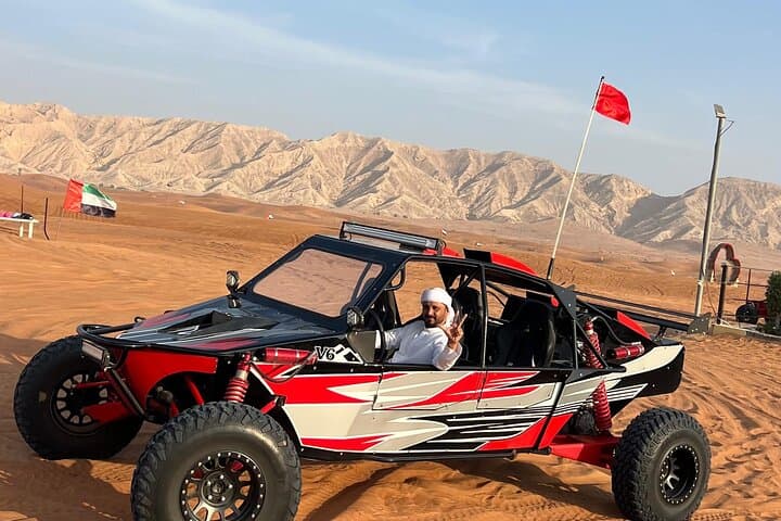 Drive Dubai's Red Dunes: 1000cc Buggy Ride with Camel & Falcon Photo photo 5